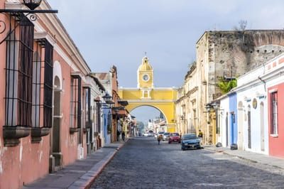 Colonial street and clock-tower arch in Antigua, Guatemala