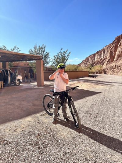 A cyclist crosses the red-rock desert outside San Pedro de Atacama, Chile.