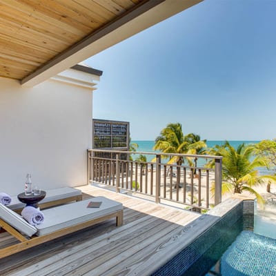 A balcony plunge pool looks over the Caribbean Sea, Belize.