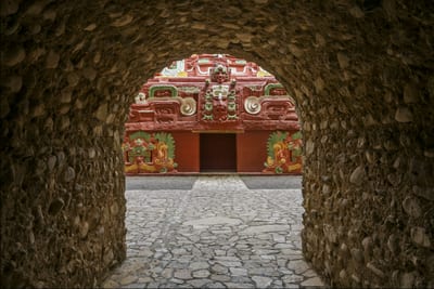 A stone pathway leading through the temple ruins of Copán, the ancient Maya city in western Honduras.