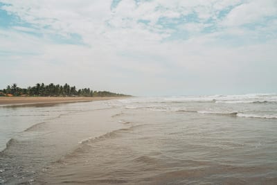 An empty golden Pacific beach on the El Salvador coast
