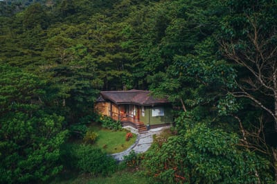 A Deluxe Suite cottage of El Silencio Lodge tucked into the cloud forest in Bajos del Toro, Costa Rica