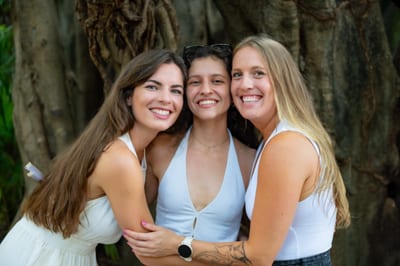 The Explore the Americas team together in a tropical setting in Latin America