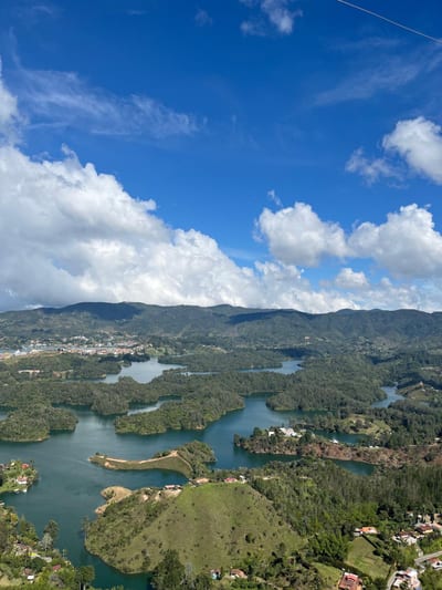 Aerial of green islands and the blue reservoir around El Penol at Guatape, Colombia.