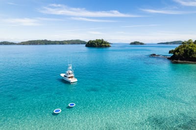 A yacht among the Pacific islands of Islas Secas, Panama.