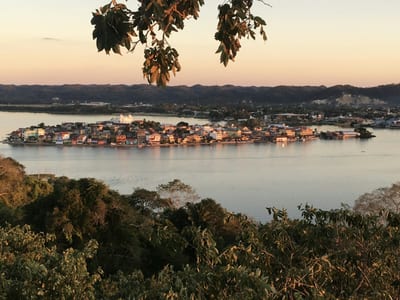 Elevated view of Flores island on Lake Peten Itza surrounded by jungle, Peten, Guatemala