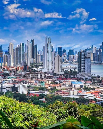 The modern glass-and-steel skyline of Panama City rising along the Bay of Panama.