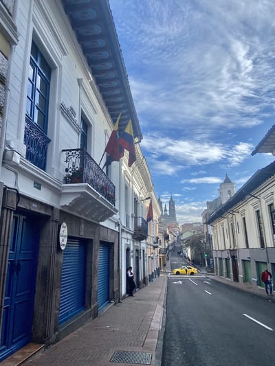 Cobblestone colonial streets and historic buildings in the old town of Quito, Ecuador