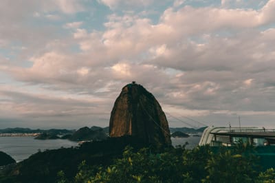 Sugarloaf Mountain rising over Guanabara Bay and the city of Rio de Janeiro, Brazil.