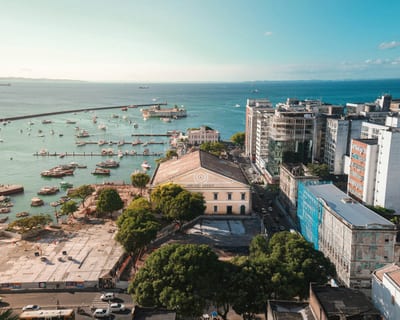 An aerial view of Salvador's waterfront and the Mercado Modelo above the boats of the Baía de Todos os Santos, Bahia, Brazil.