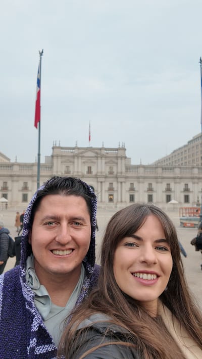 Chile's presidential palace, La Moneda, and its flag-lined plaza in central Santiago.
