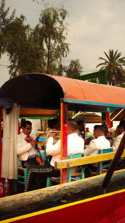 Colorful trajinera boats on the canals of Xochimilco, Mexico City.