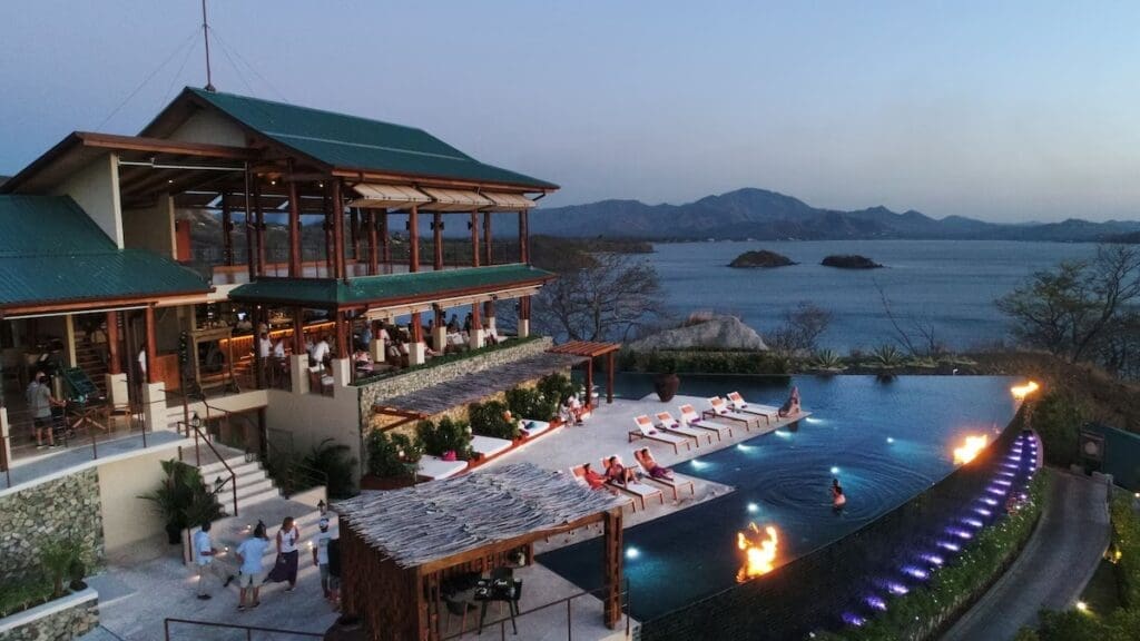 Casa Chameleon Las Catalinas infinity pool overlooking the Pacific Ocean Costa Rica with fire pits